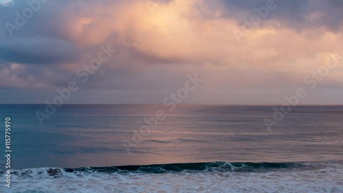 Calm ocean surf at beautiful sunset photo