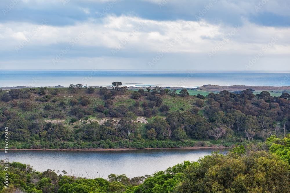 View from Tower Hill Reserve, Victoria, Australia. Crater lake, coutryside, and the ocean.