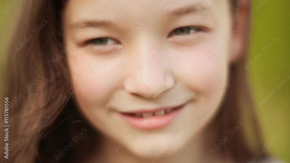The face of a young girl of 11 years old close-up. The face of a young girl of 11 years old close-up.