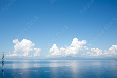 Clouds sky reflected in sea © orlio
