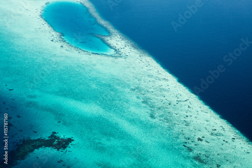 Parasailing over tropical sea, bright colors photo