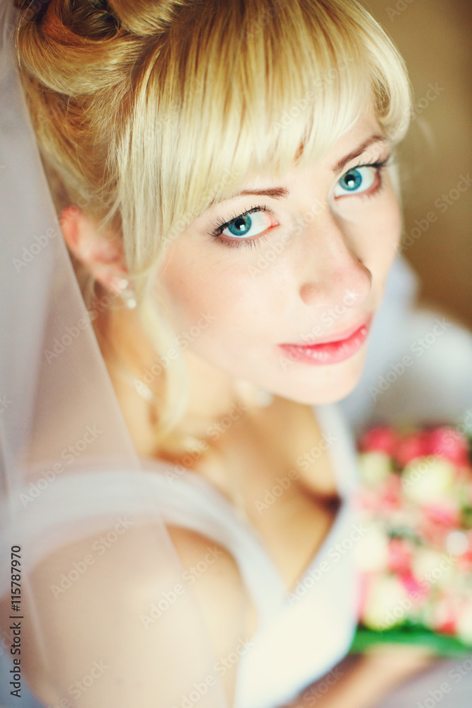 A blonde bride with rose lips looks tender and stunning A blonde bride with rose lips looks tender and stunning