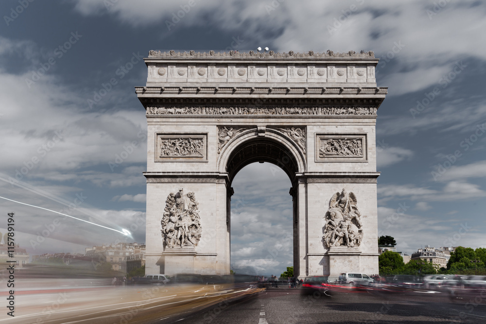 Triumphal arch. Paris. France. View of Place Charles de Gaulle. Famous touristic architecture landmark in summer day. Napoleon victory monument. Symbol of french glory. World historical heritage.