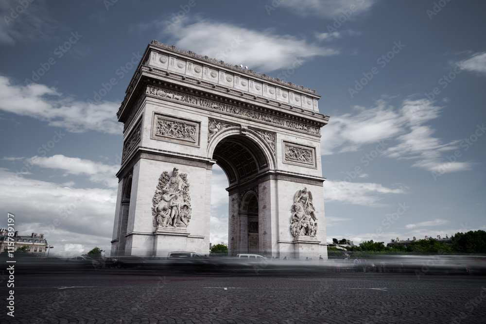 Triumphal arch. Paris. France. View of Place Charles de Gaulle. Famous touristic architecture landmark in summer day. Napoleon victory monument. Symbol of french glory. World historical heritage.