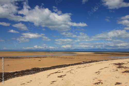 Summer clouds over Marahau beach