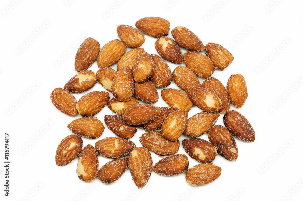 Almonds baking with salt on white background. Almonds baking with salt on white background.