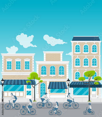 Colorful city with people riding bicycles on the street.

