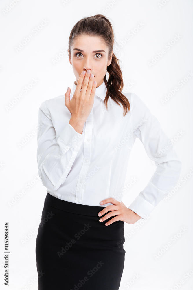 Businesswoman covering her mouth with palm isolated Businesswoman covering her mouth with palm isolated