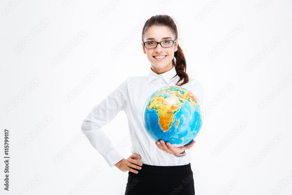 Cheerful pretty young businesswoman smiling and holding globe Cheerful pretty young businesswoman smiling and holding globe