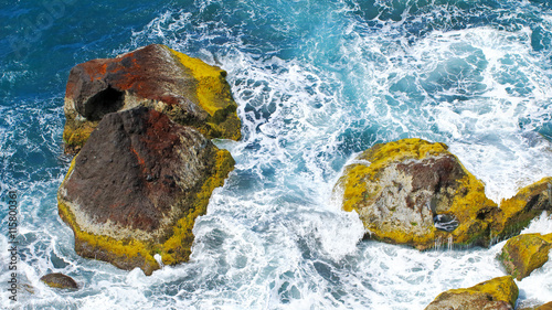 Top view of the surf and rocks