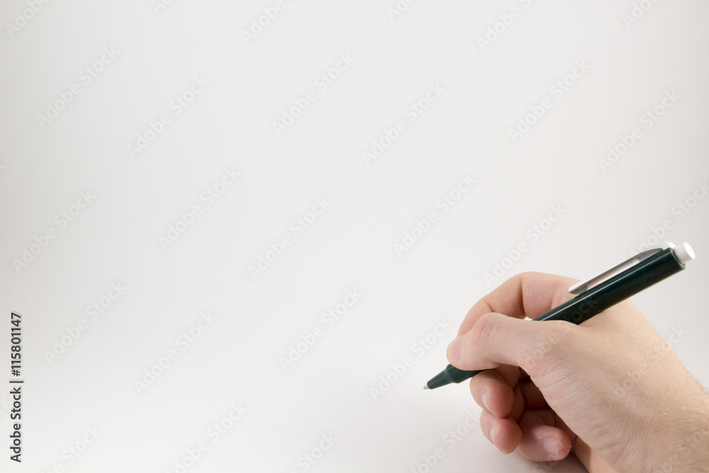 Hand with a pen on a white background Hand with a pen on a white background