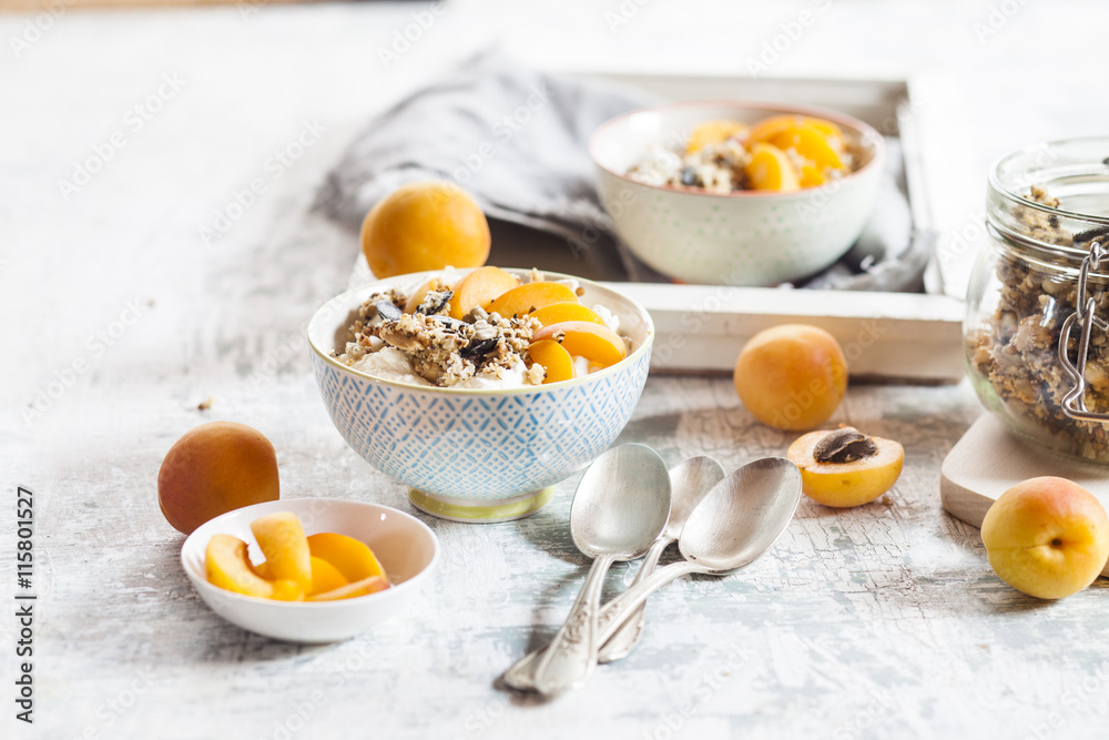 Yogurt with crunchy muesli and fresh apricot Yogurt with crunchy muesli and fresh apricot