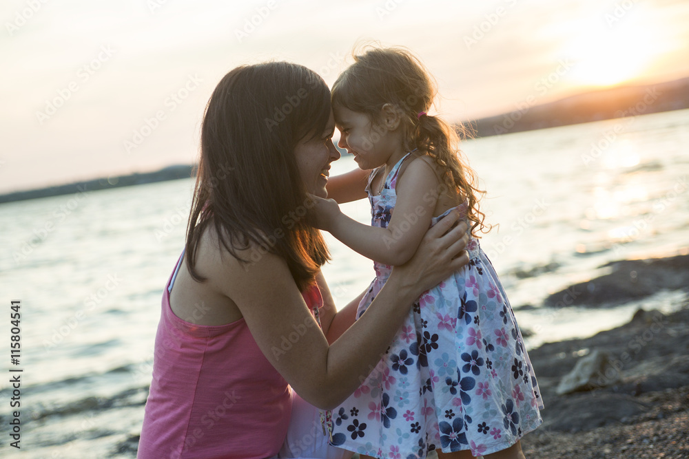 happy joyful mother with is child sunset happy joyful mother with is child sunset