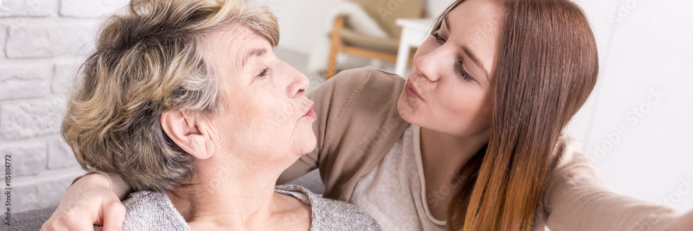 Intergenerational selfie photo with kiss face Intergenerational selfie photo with kiss face