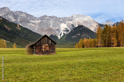Autumn rural scenery of Miemenger Plateau with rocky mountains peaks in the background. Austria, Europe, Tyrol.