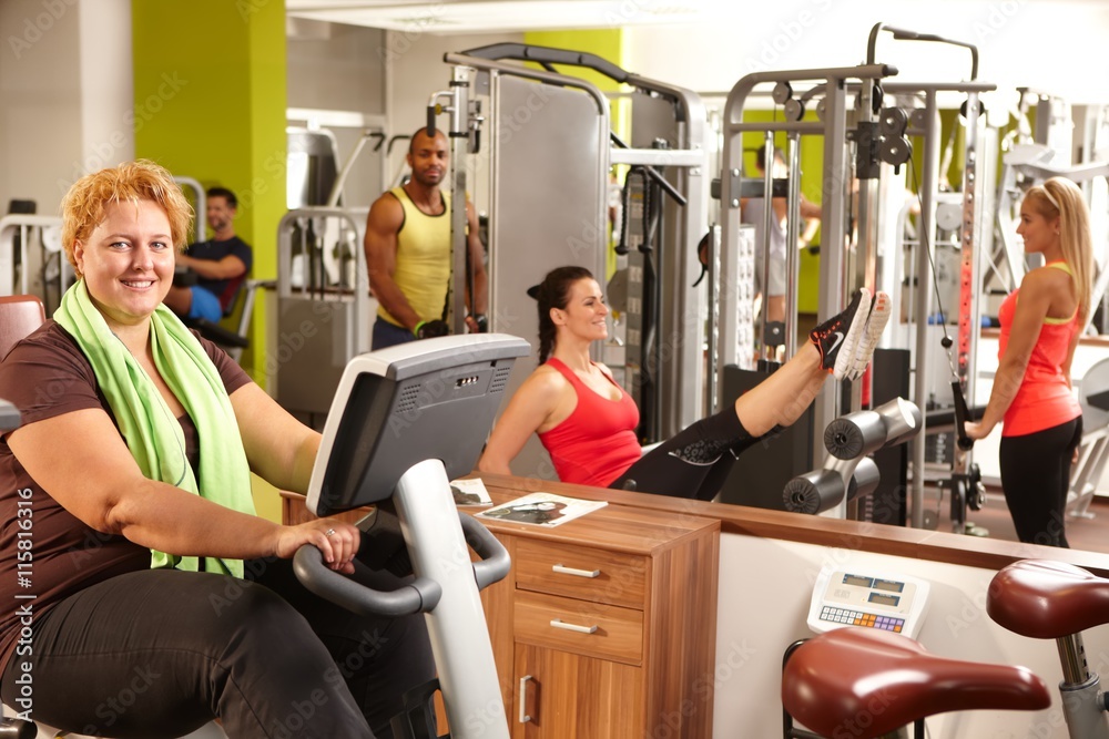 Overweight woman in gym