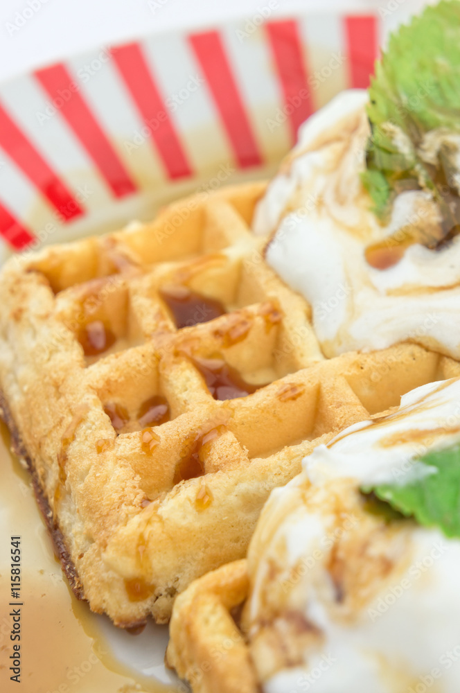 Belgian waffles with ice cream and caramel sauce Belgian waffles with ice cream and caramel sauce