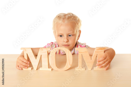 Funny little girl hiding be...
