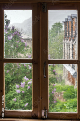 Raindrops on a window pane  summer.