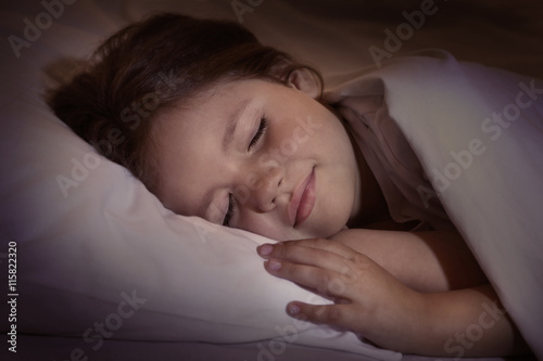 Adorable sleeping little gi...