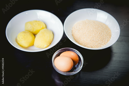 Ingredients cooked meals, boiled potatoes and eggs
