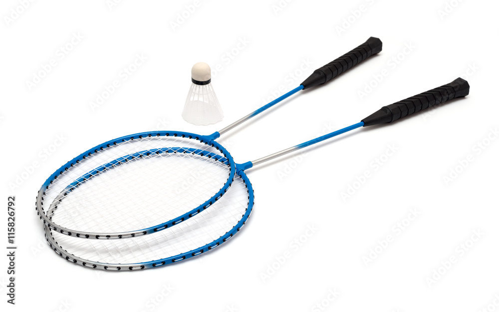 child's hand holding a badminton racket on a white child's hand holding a badminton racket on a white