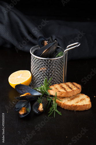 Fresh cooked mussels with Lemon and salt