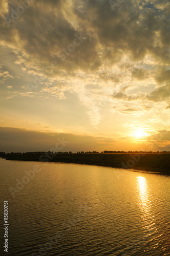 reflection on the river in sunset background.