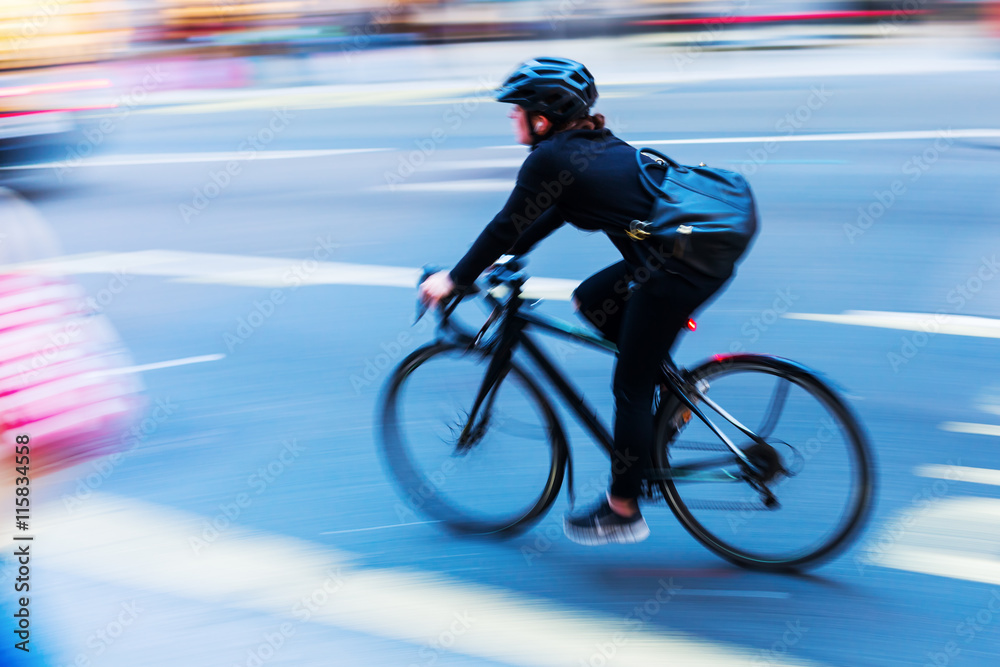 Naklejka premium cyclist in motion blur