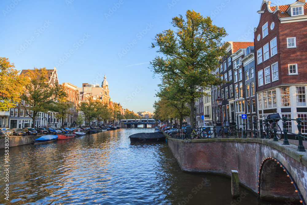 Canal of Amsterdams, cityscape at sunset
