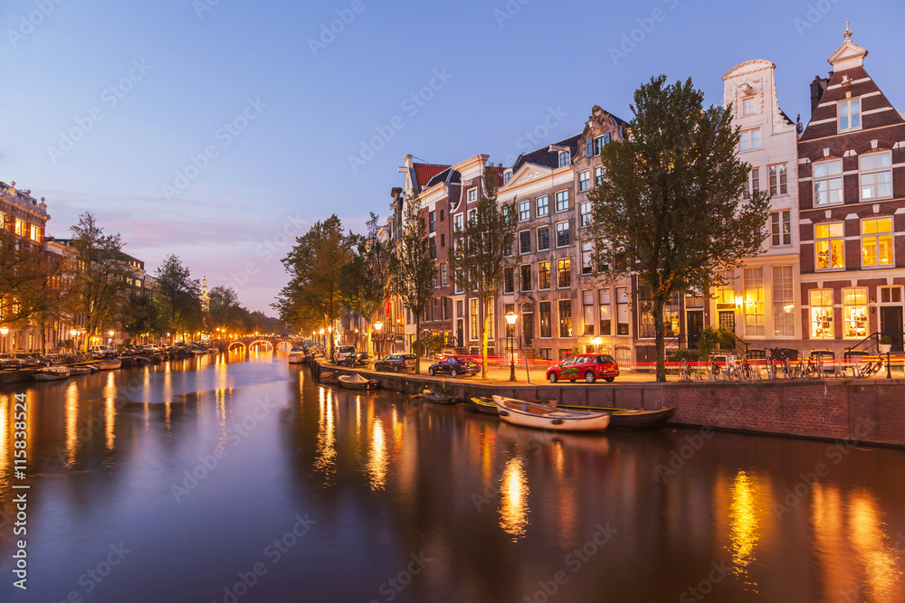 Beautiful authentic dutch with canal of Amsterdams at twilight night