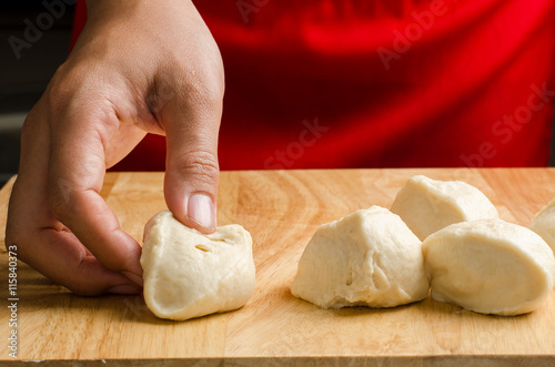Kneading dough on wooden plate,bread cooking 