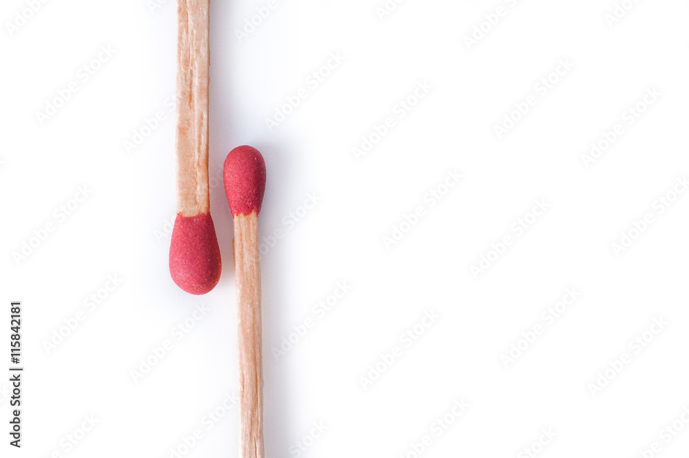 Close-up of red matches on white background Close-up of red matches on white background