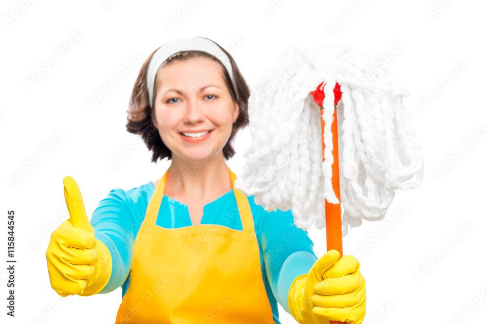 satisfied housewife with a mop showing hand gesture on white bac satisfied housewife with a mop showing hand gesture on white bac