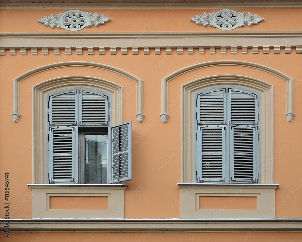 Two Windows on the orange wall 