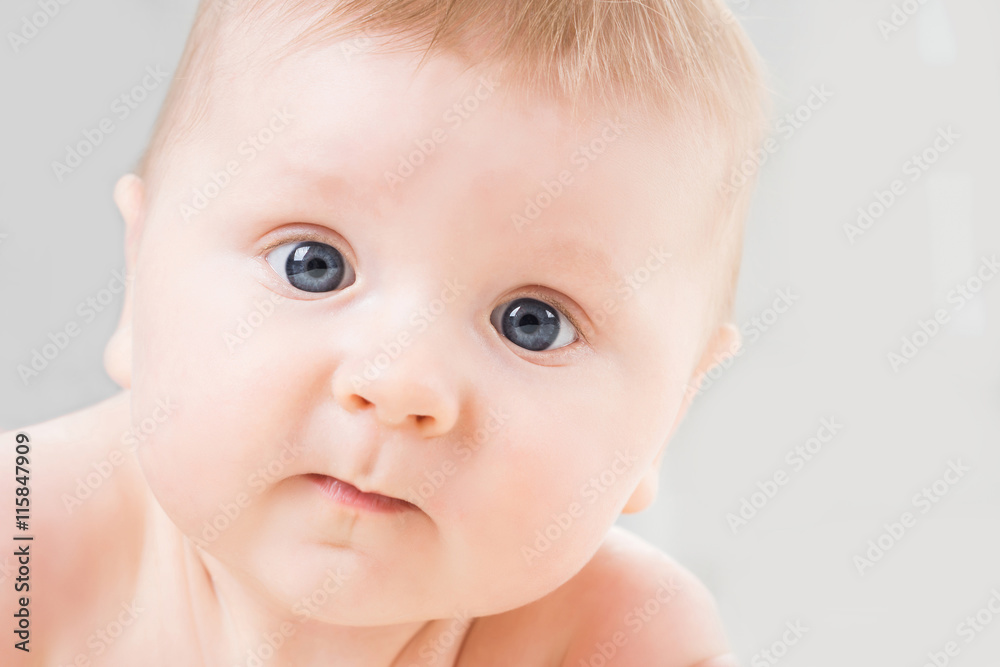 Portrait of a cute smiling infant baby. Portrait of a cute smiling infant baby.