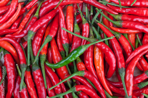 green chilli on red chili or chilli cayenne pepper