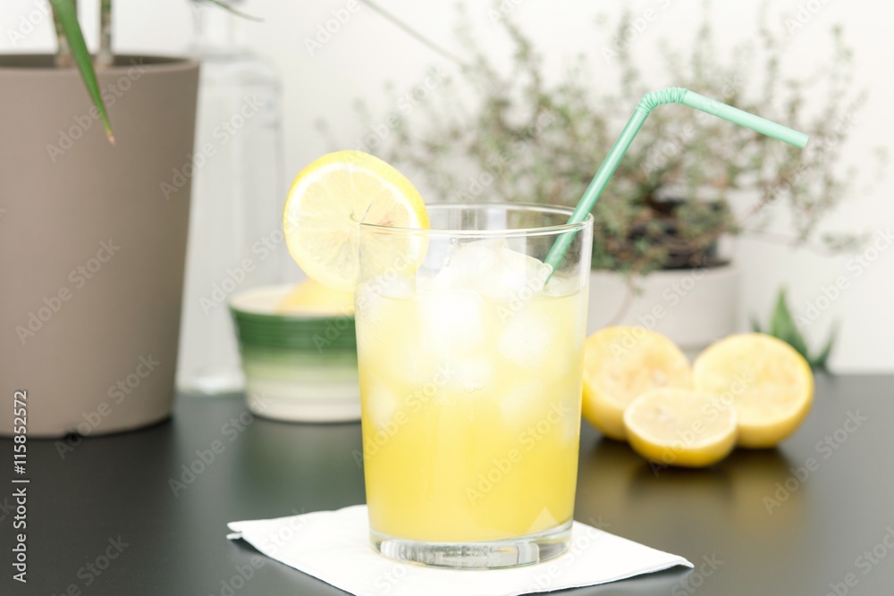 Orangeade with lemon and ice for refresh in summer Orangeade with lemon and ice for refresh in summer