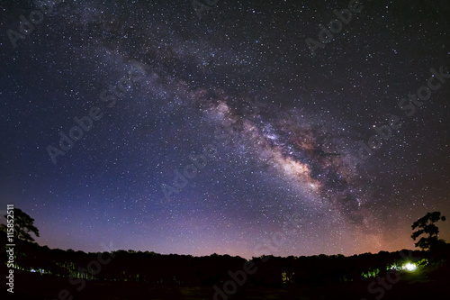 Panorama milky way and silhouette of Tree with cloud. Long expos