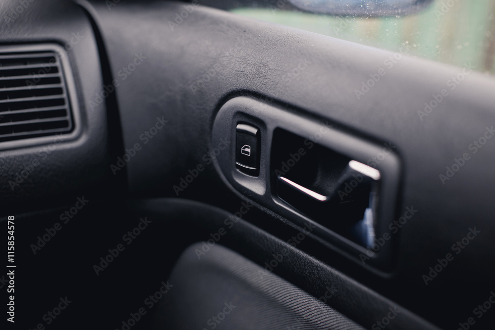Handle door opening in the vehicle. Window button.