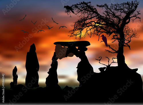 Scary halloween landscape with silhouettes of tree, birds and stone gate. Dramatic red sunset with mysterious person in a hood 