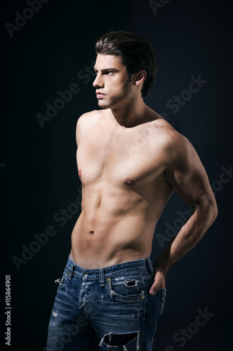 Shirtless muscular man in jeans