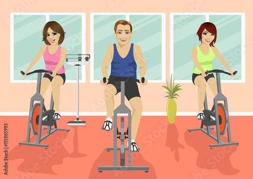 Group of people in gym, exercising their legs doing cardio training