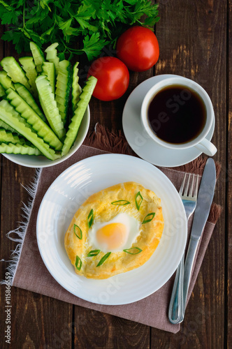 Khachapuri in Adjara (flat cakes with different fillings in the form of a boat) - the national dish of Georgian cuisine. And a cup of tea