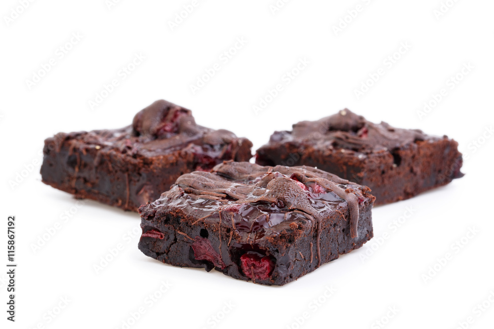 Delicious vegetarian brownie with cherries isolated on white bac Delicious vegetarian brownie with cherries isolated on white bac