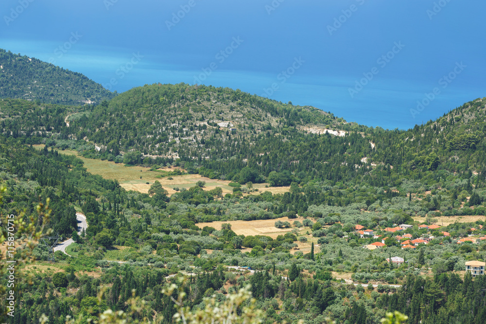Village of Kalamitsi, Lefkada, Greece. Panoramic view on Kalamitsi  village and Lefkada coast on a beautiful sunny day 