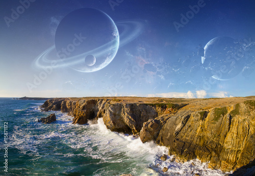 Fototapeta Naklejka Na Ścianę i Meble -  View of distant planet system from cliffs