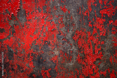 background made of a close-up of a peeled red wall texture, It can be used as a background, high contrast and over light