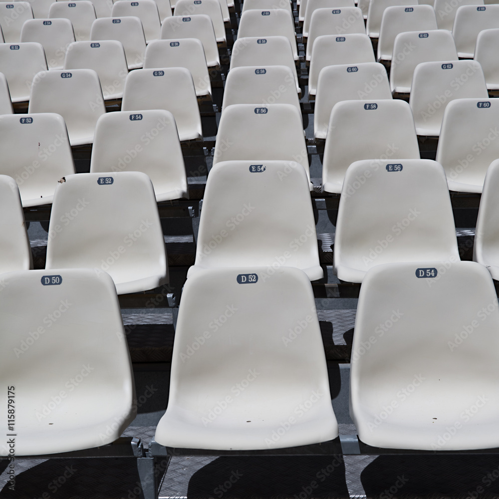 Fototapeta premium Empty numbered seats in a stadium