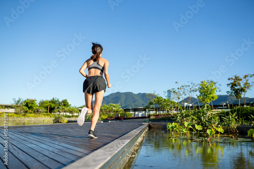 Woman running at borad walk